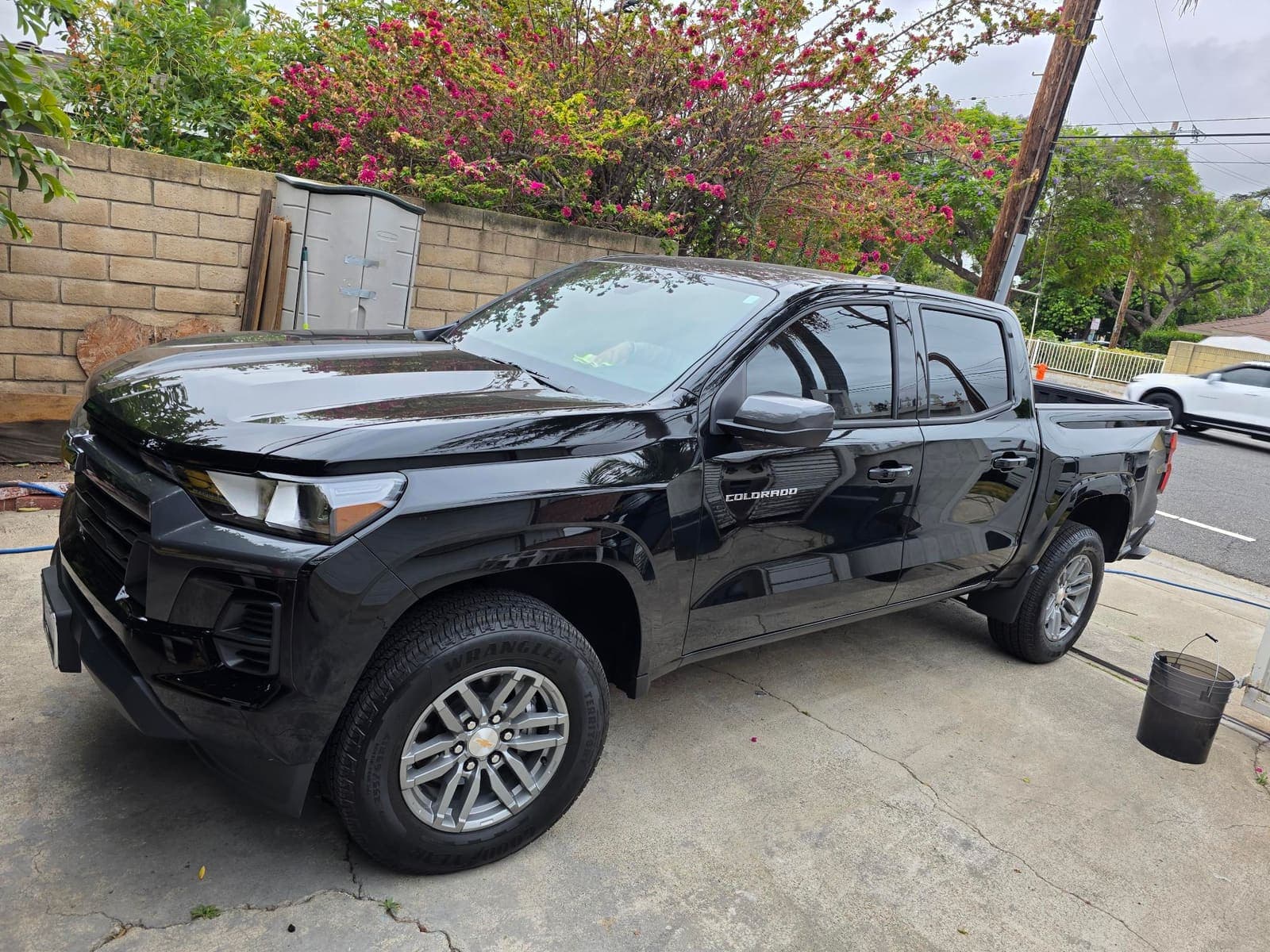 Black Chevy Colorado with a high-gloss finish after detailing